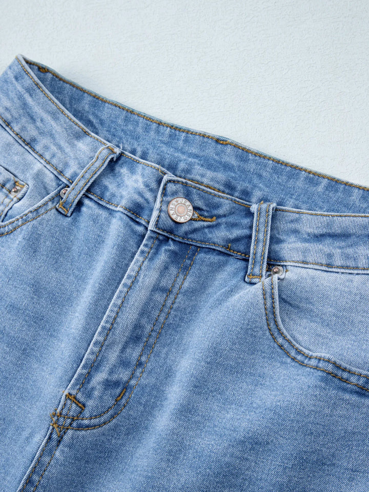High-rise wide-leg jeans with released hem