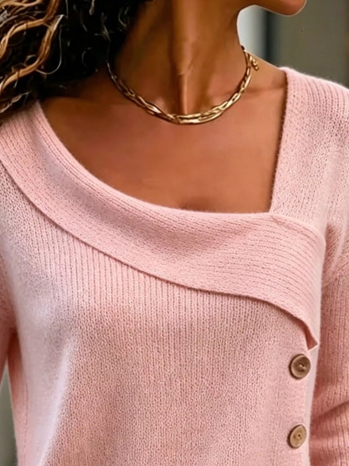 Asymmetrical button sweater with angled ribbed neckline