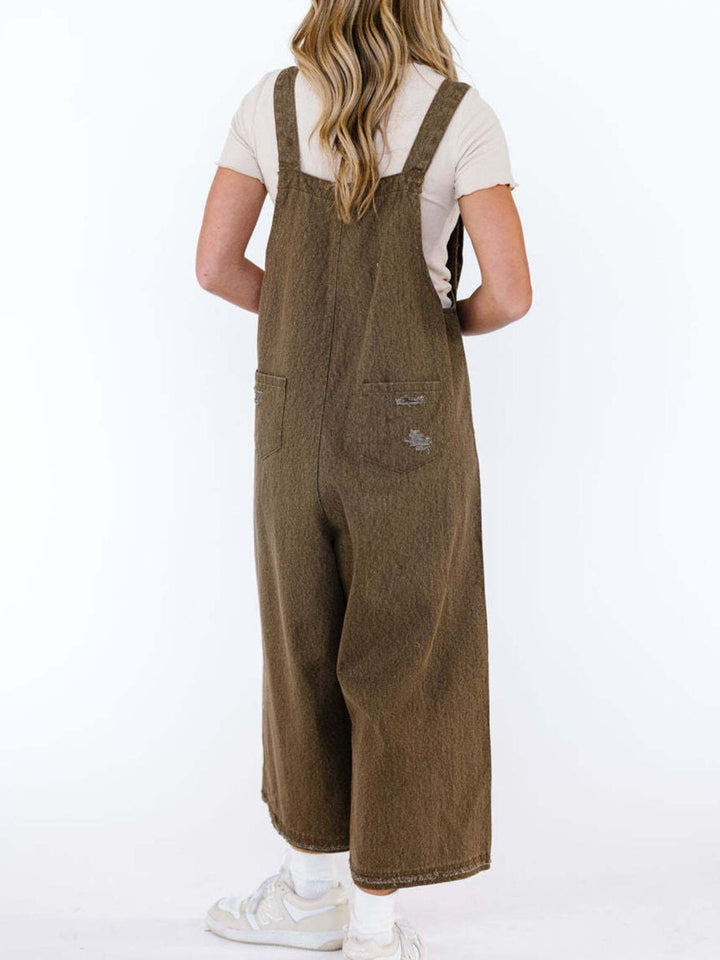 Distressed wide leg denim overalls with adjustable straps