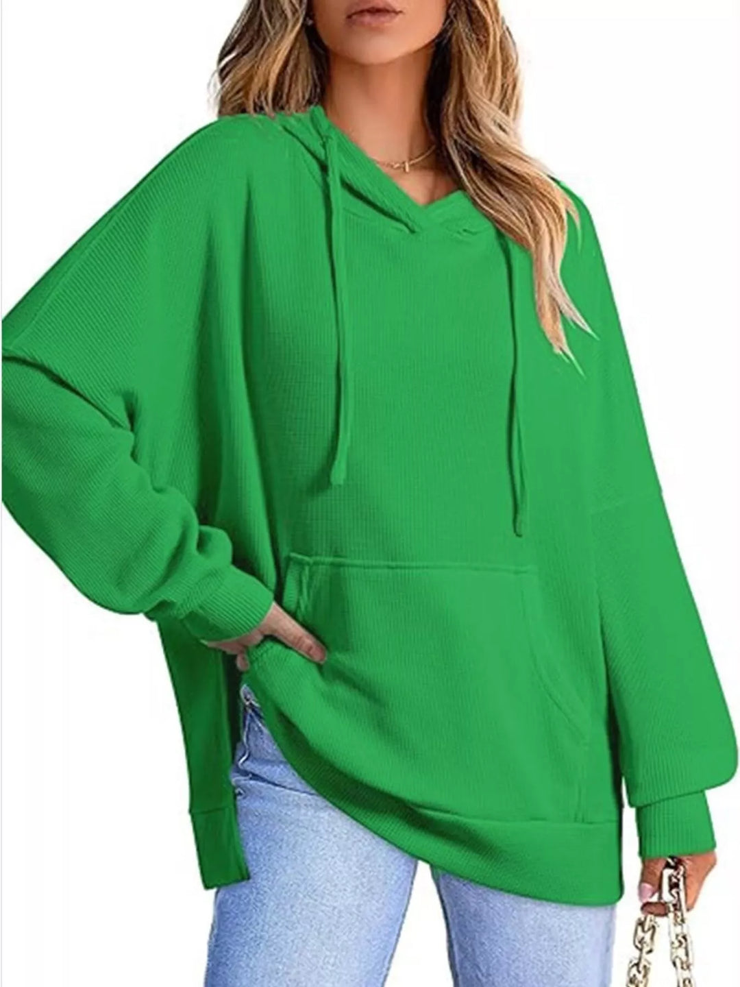 Oversized waffle-knit hoodie with side slits and front pocket