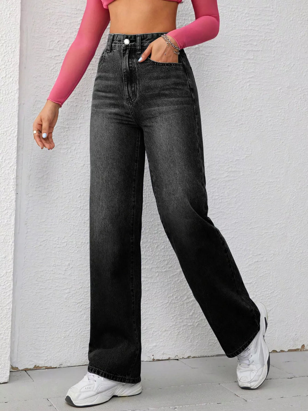 High-rise wide-leg washed jeans with whiskering