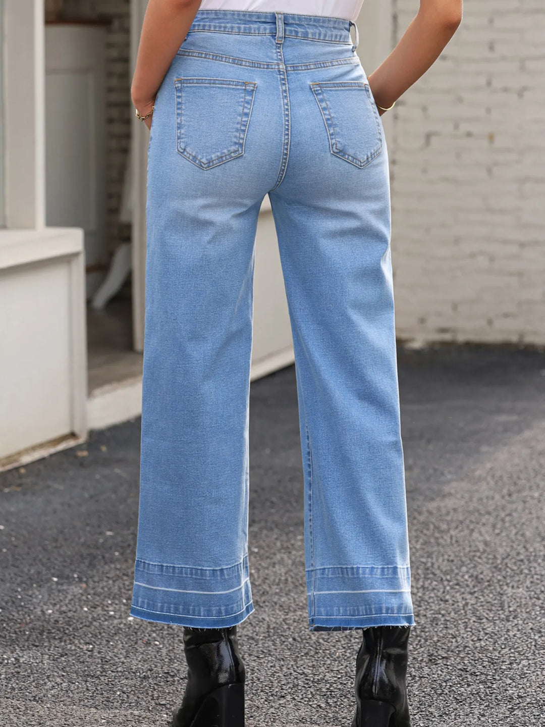 High-rise wide-leg jeans with released hem
