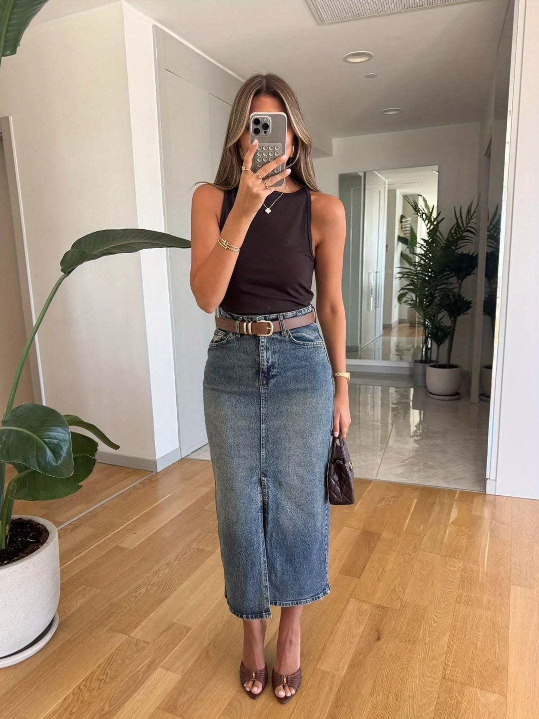 High-rise midi denim skirt with front slit