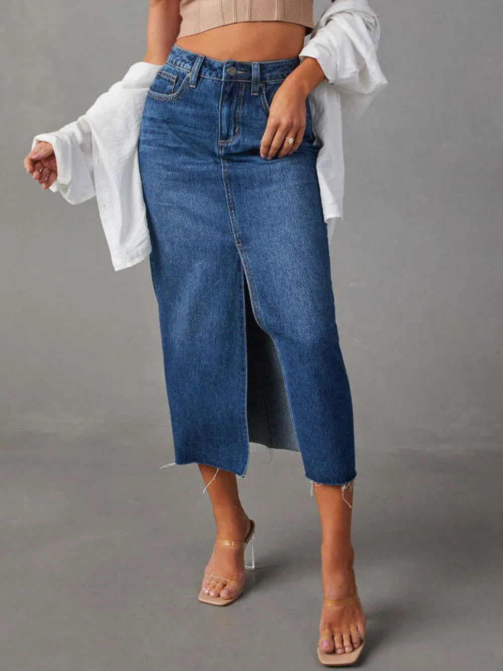 Medium High-rise denim midi skirt with raw hem and front slit