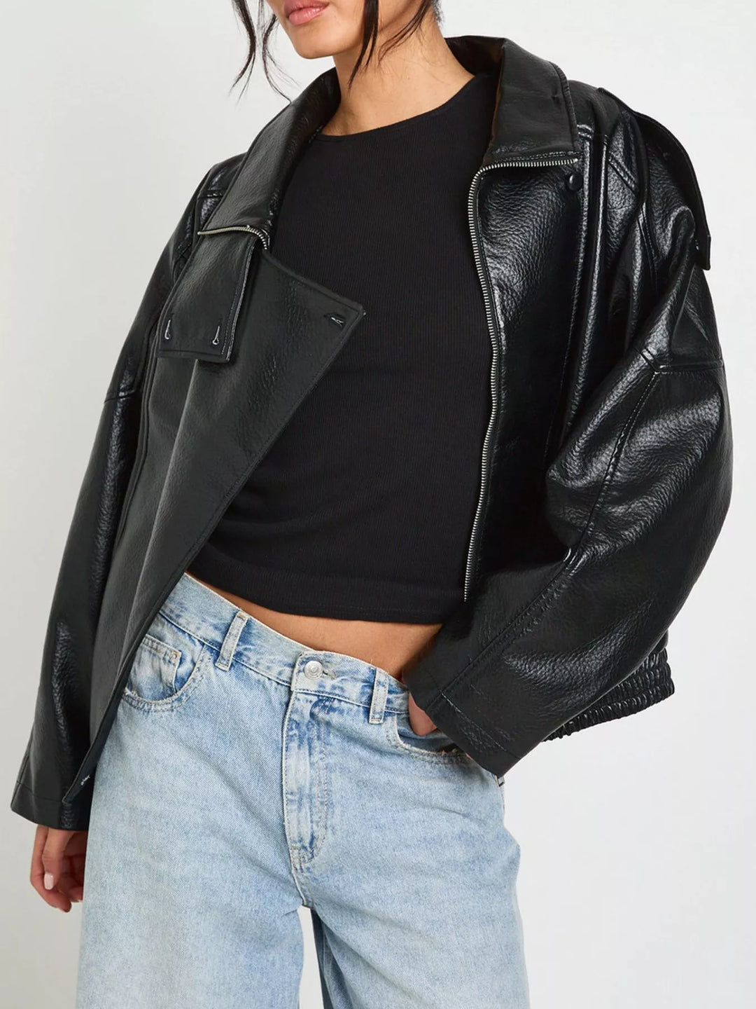 Oversized faux leather moto jacket with asymmetrical zip