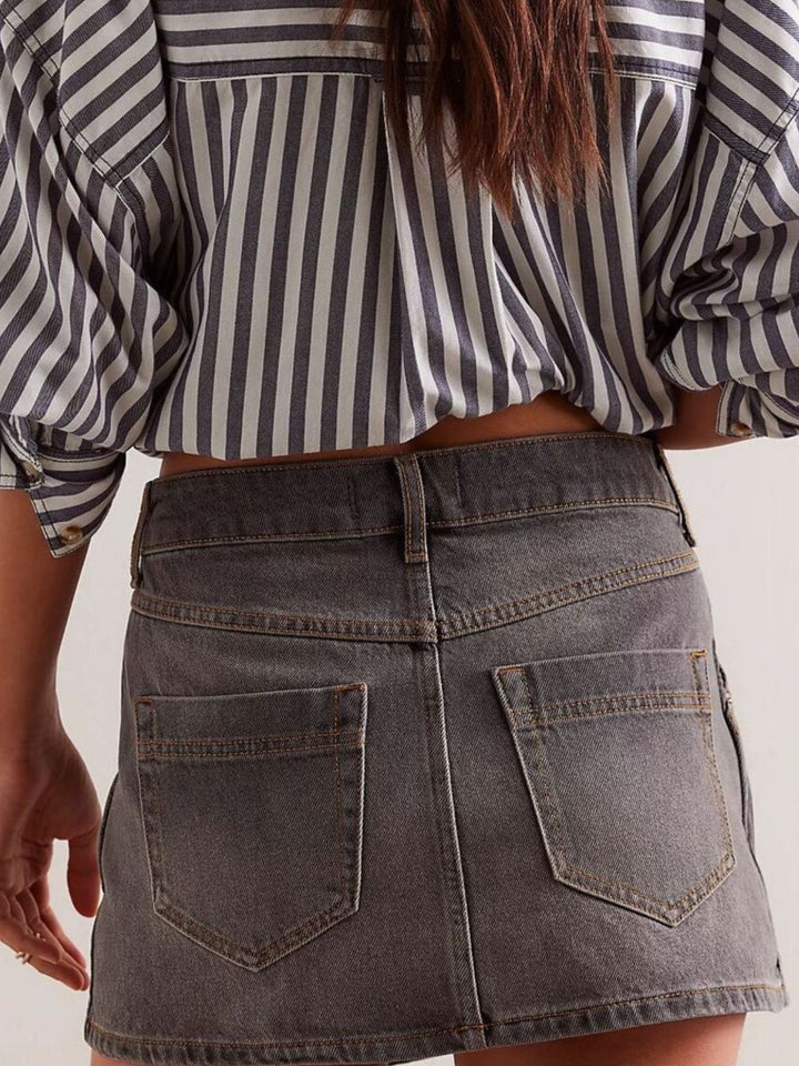 Asymmetrical button-front denim mini skirt