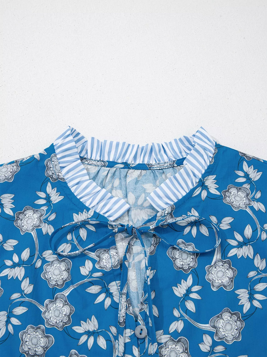 Floral print blouse with ruffle sleeves and split neck tie