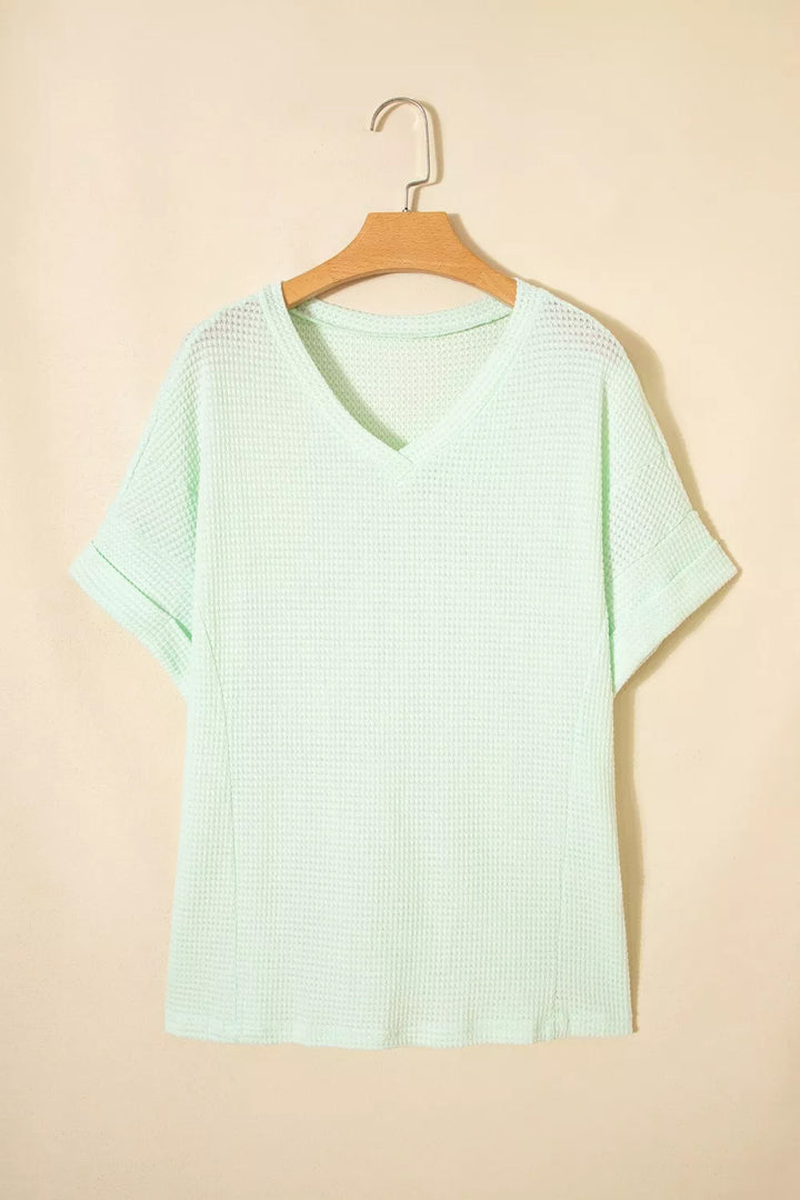 Plus size waffle knit V-neck top with cuffed short sleeves