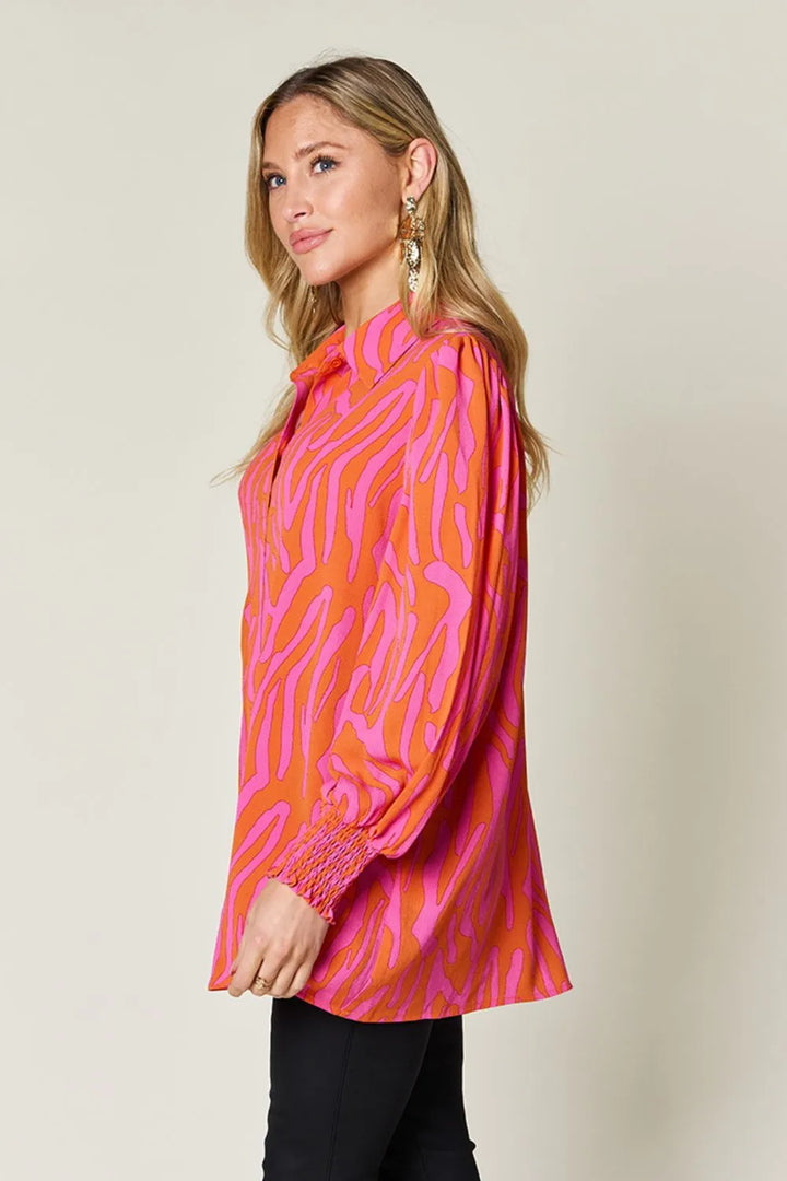 Zebra print smocked-cuff long sleeve blouse