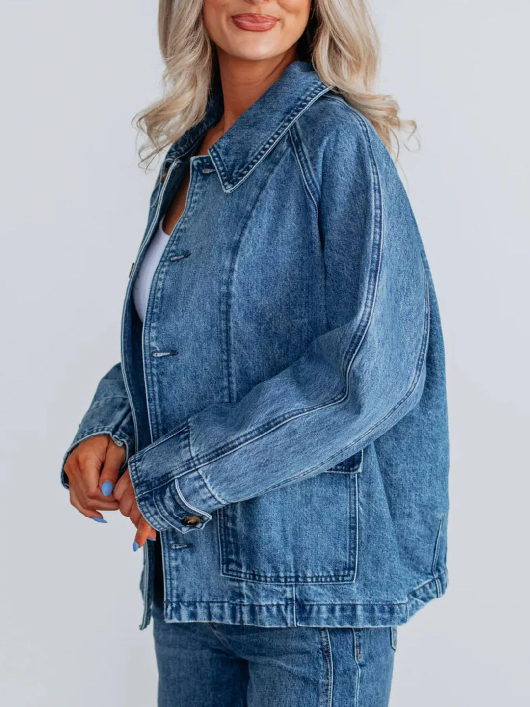 Oversized button-up denim jacket with raglan sleeves