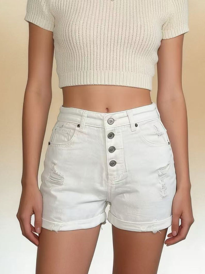 High-rise distressed denim shorts with button fly and rolled hem