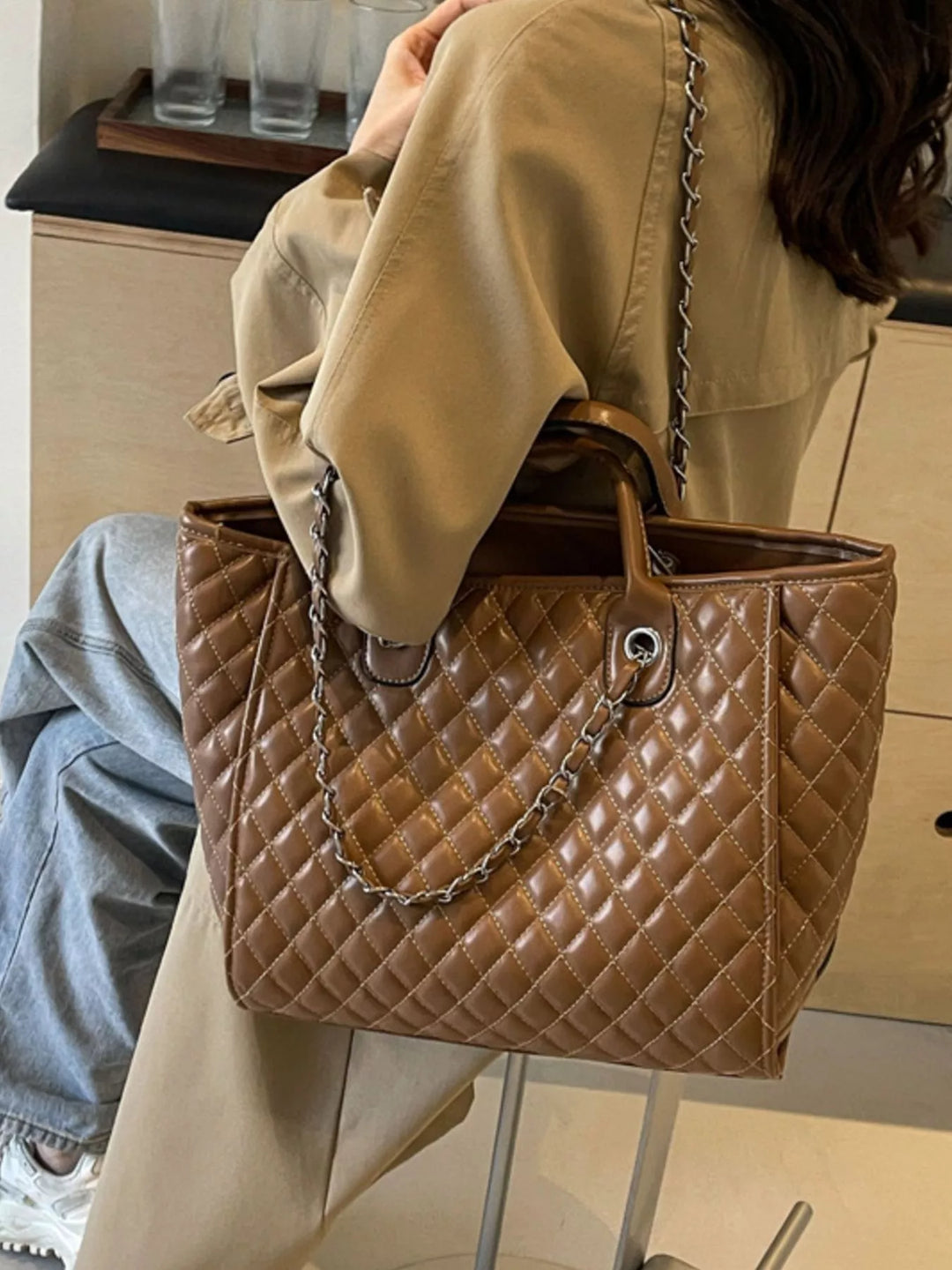 Diamond quilted faux leather tote bag with chain straps