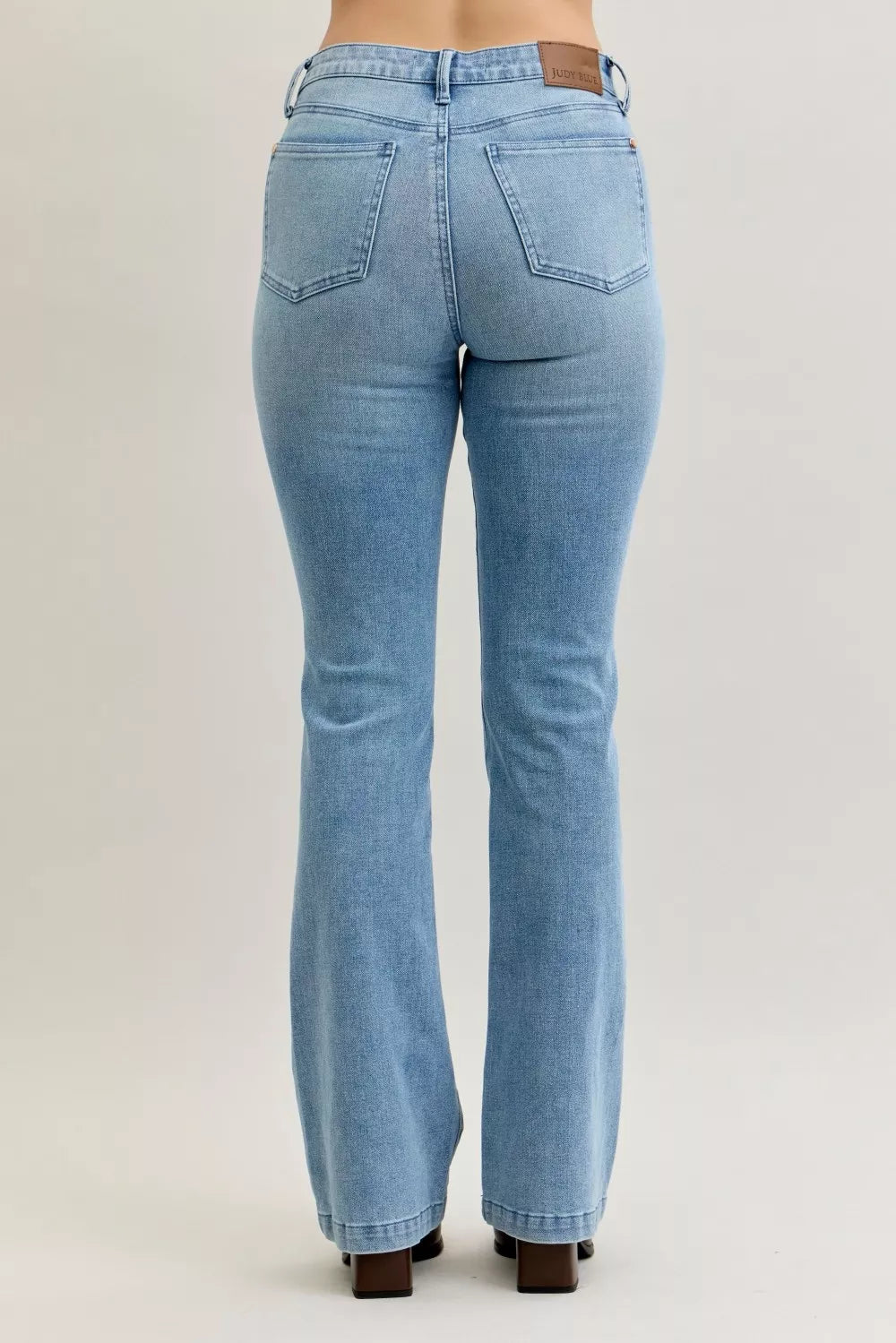 Mid-rise contrast wash bootcut jeans with front patch pockets