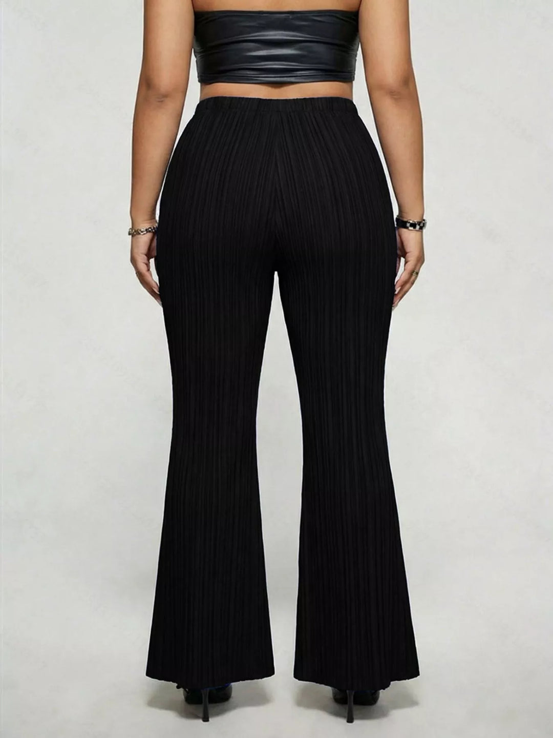 Plus size high-rise ribbed flare pants with buckle detail