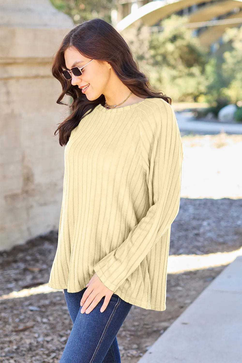 Relaxed ribbed knit round neck long sleeve top