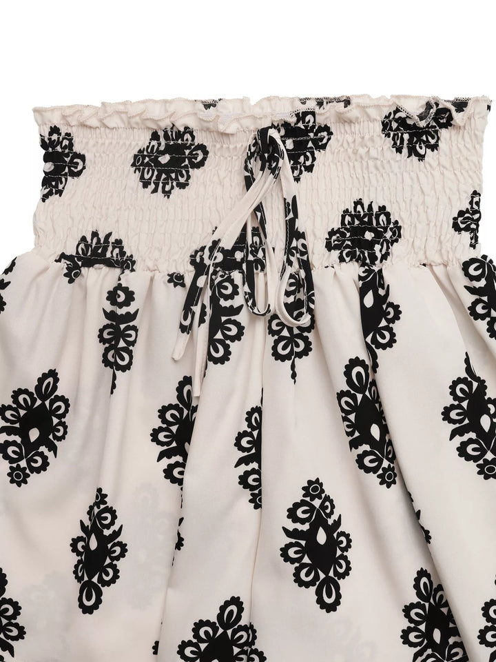 Smocked high-rise shorts with medallion print and tie waist