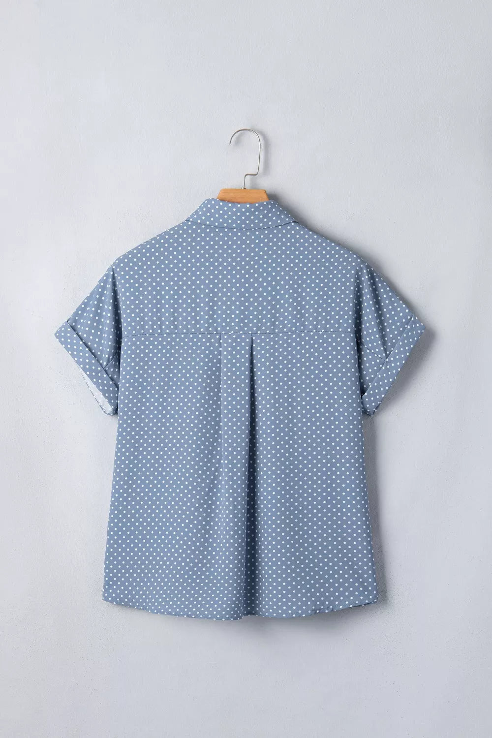 Polka dot button-down shirt with cuffed short sleeves