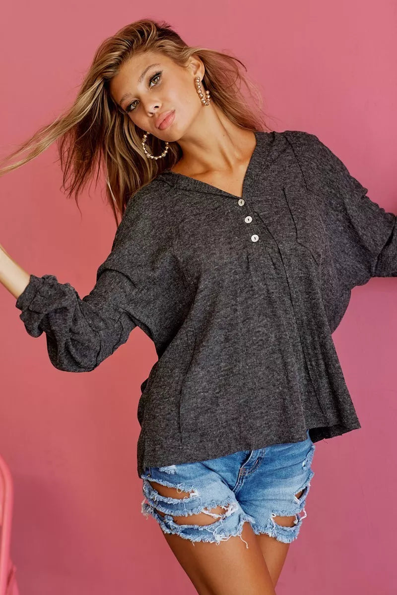 Textured knit hoodie with button placket and patch pocket
