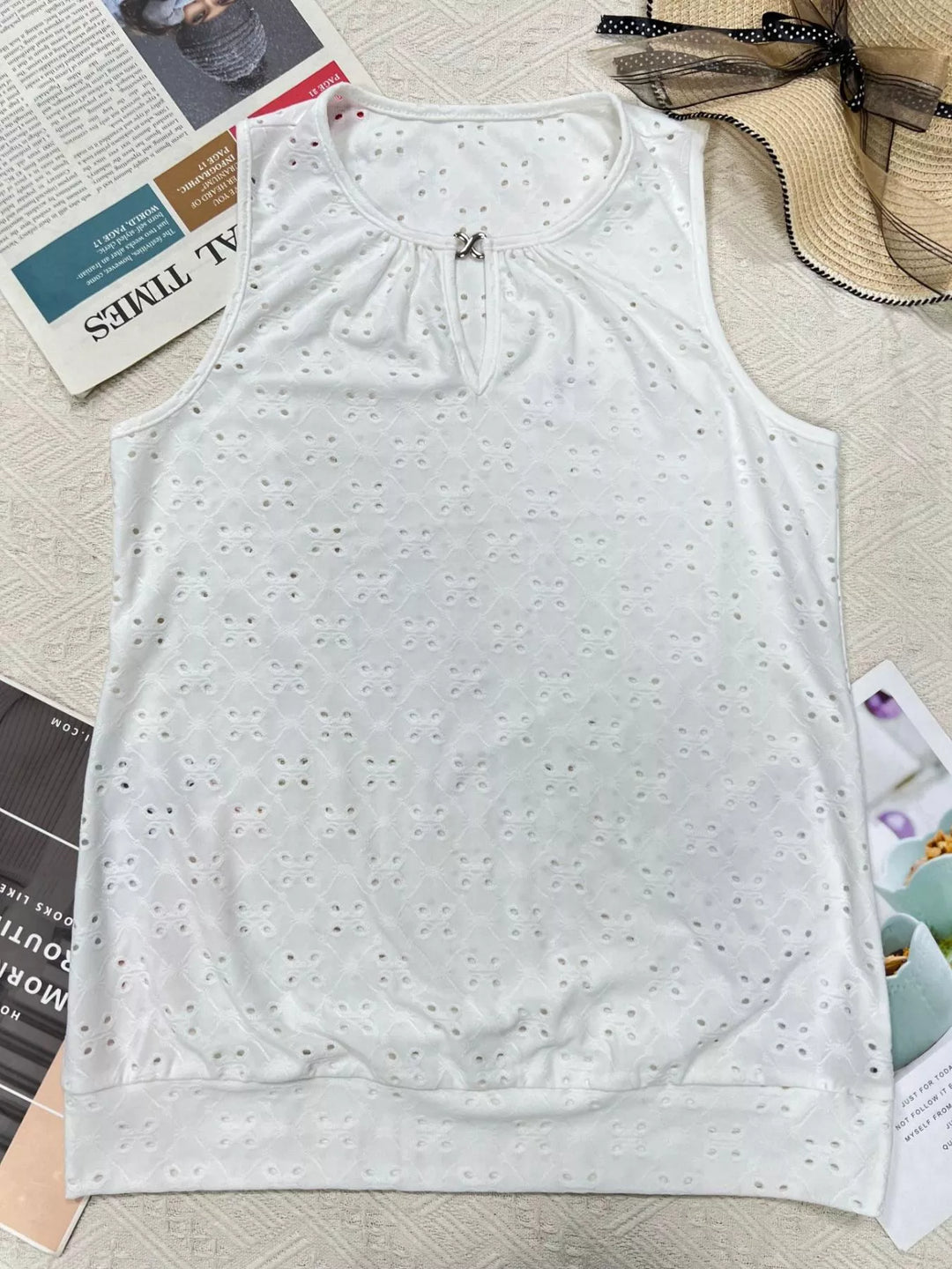 Eyelet sleeveless cami with keyhole neckline and metal ring accent