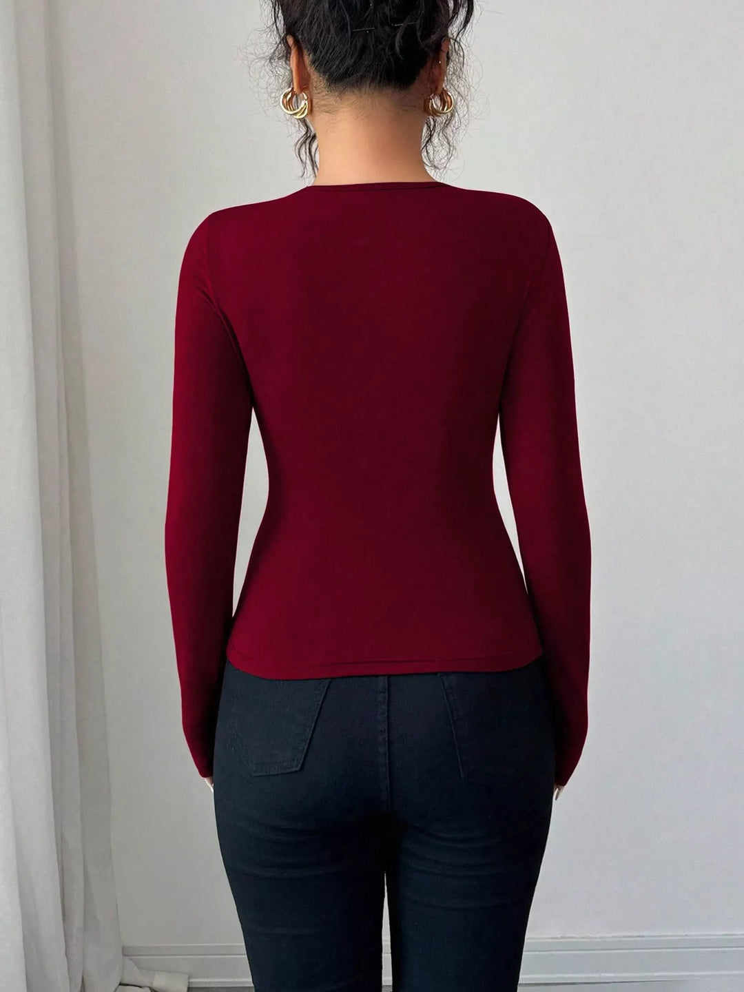 Twist front ring detail long sleeve top with cutout