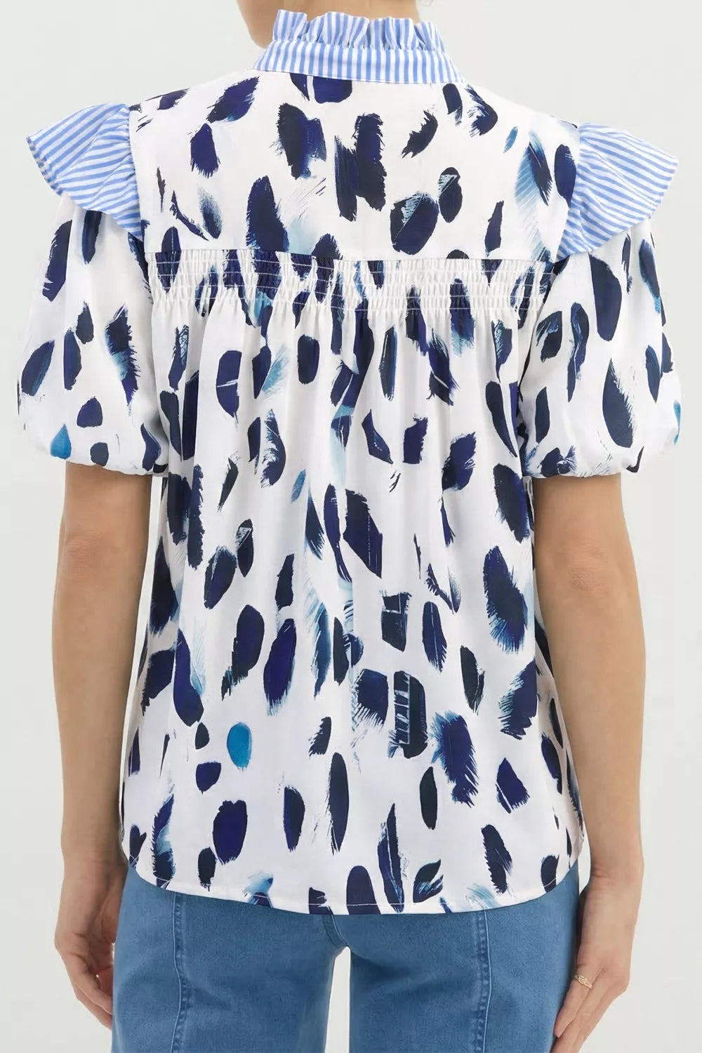 Abstract animal print blouse with striped ruffle yoke