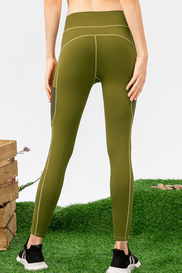 High-rise workout leggings with mesh side pockets