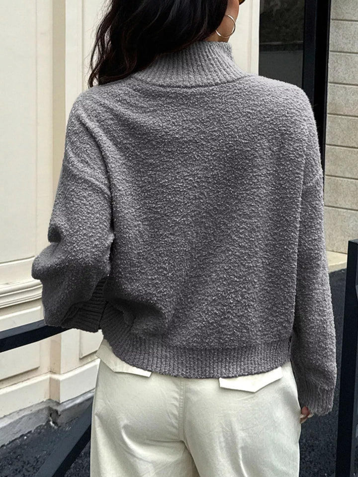 Textured knit turtleneck sweater with drop shoulders