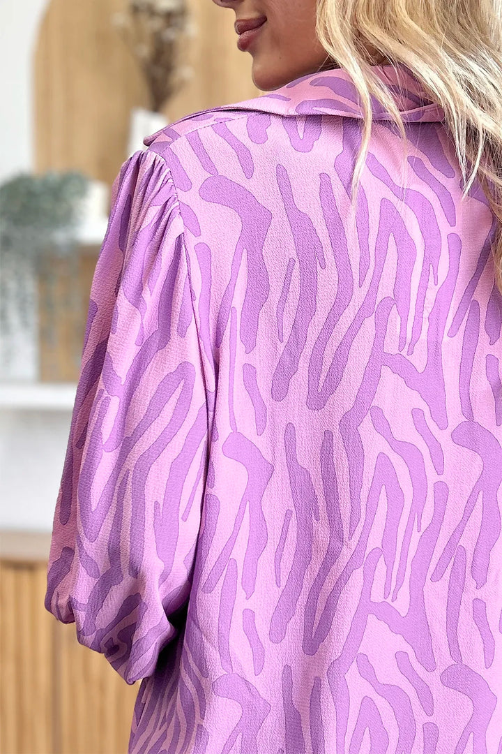 Zebra print smocked-cuff long sleeve blouse
