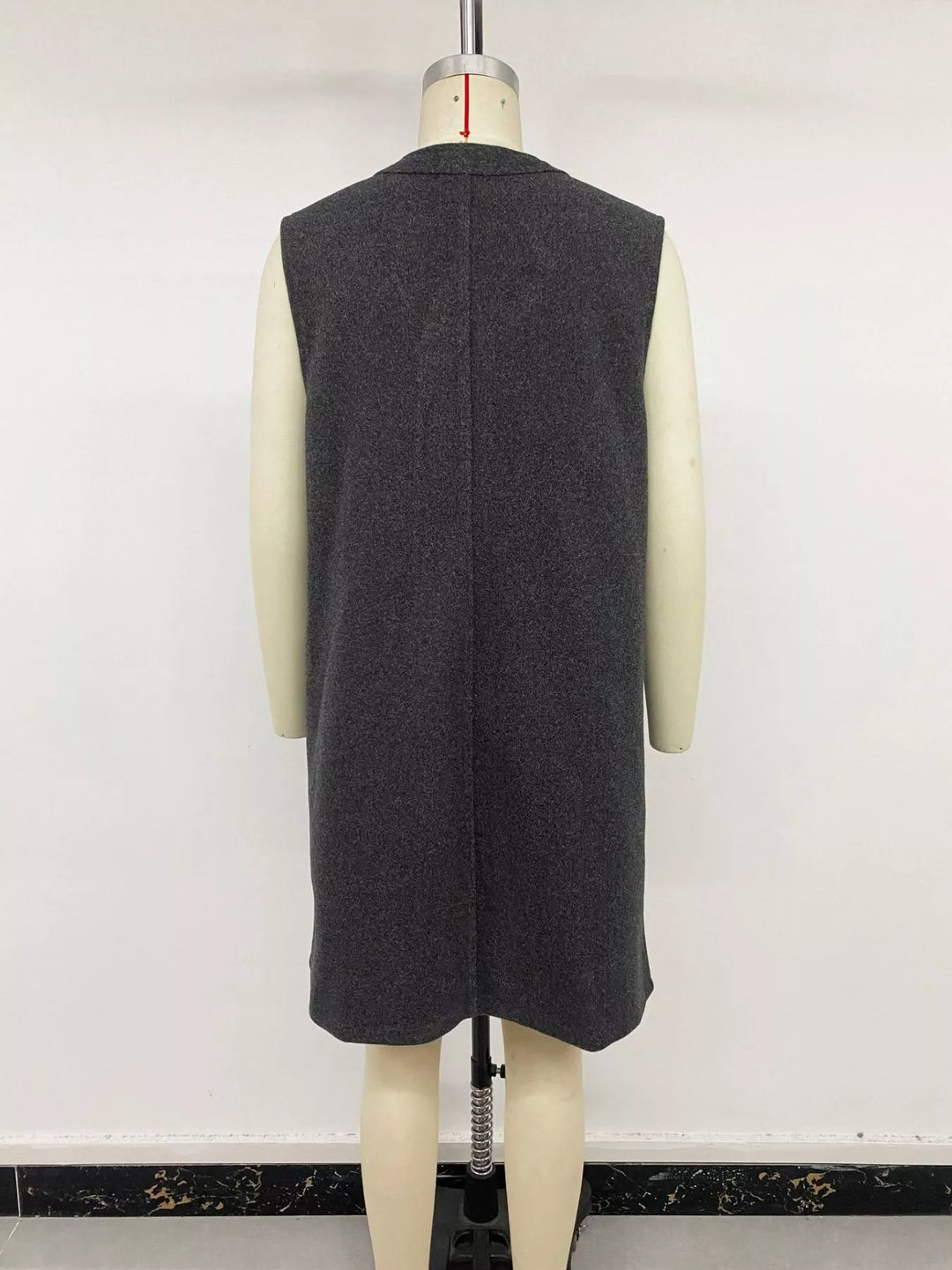 Longline sleeveless button-front vest coat