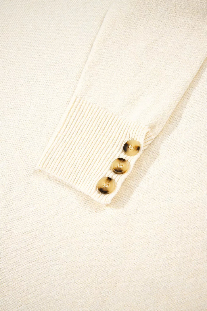 Button-cuff raglan sleeve crew neck sweater
