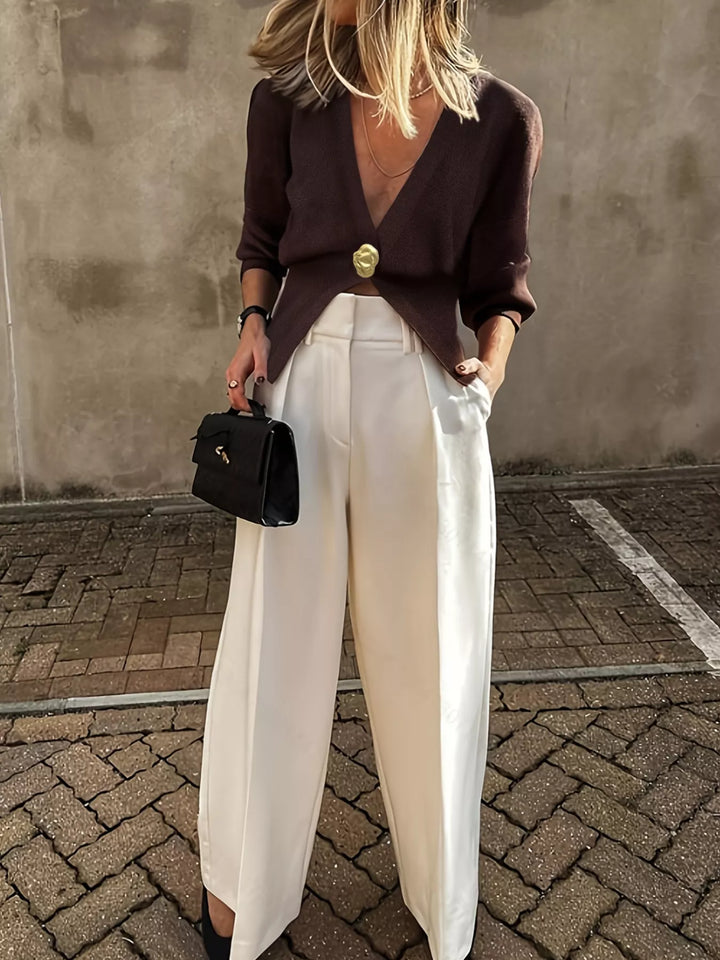 Gold-button deep V-neck knit cardigan with split hem