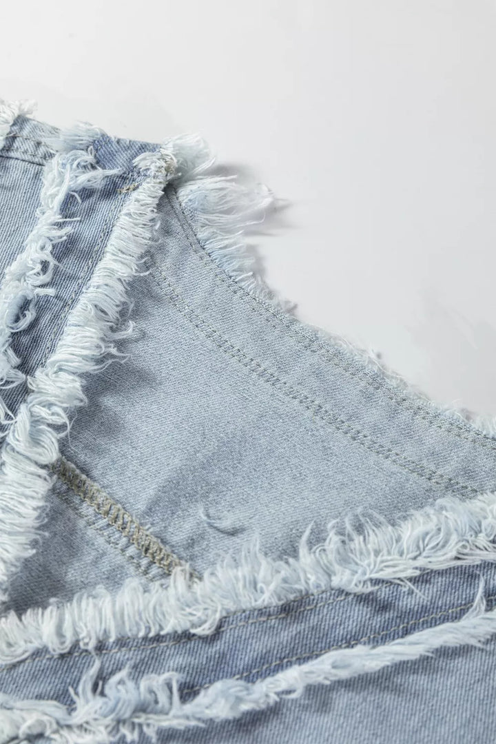 Frayed edge denim vest with snap flap pockets