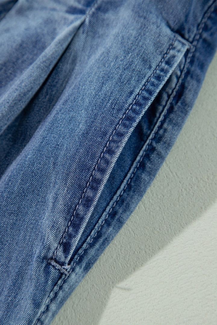 Pleated high-rise wide-leg jeans with deep pockets