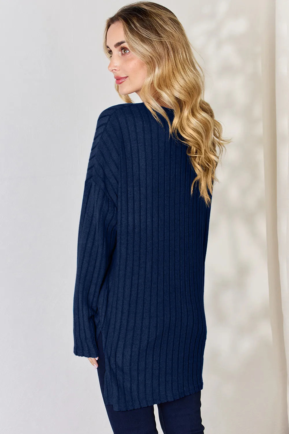 Ribbed knit half-button long sleeve high-low top