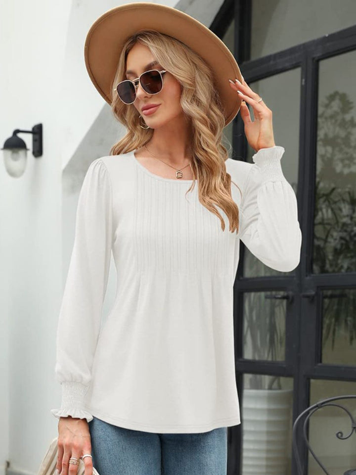White Pleated front lantern sleeve blouse with smocked cuffs