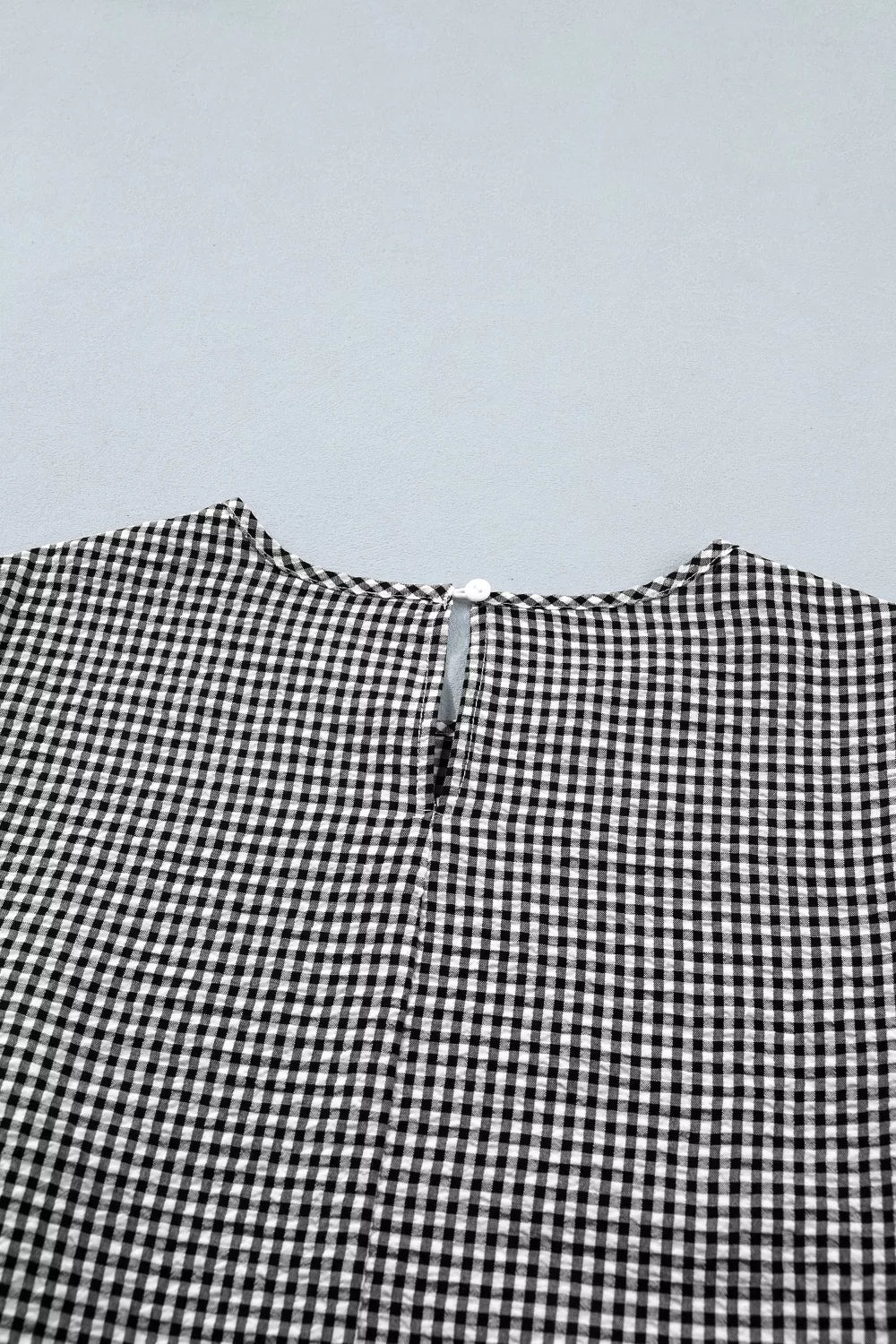 Gingham ruffle half-sleeve crew neck blouse