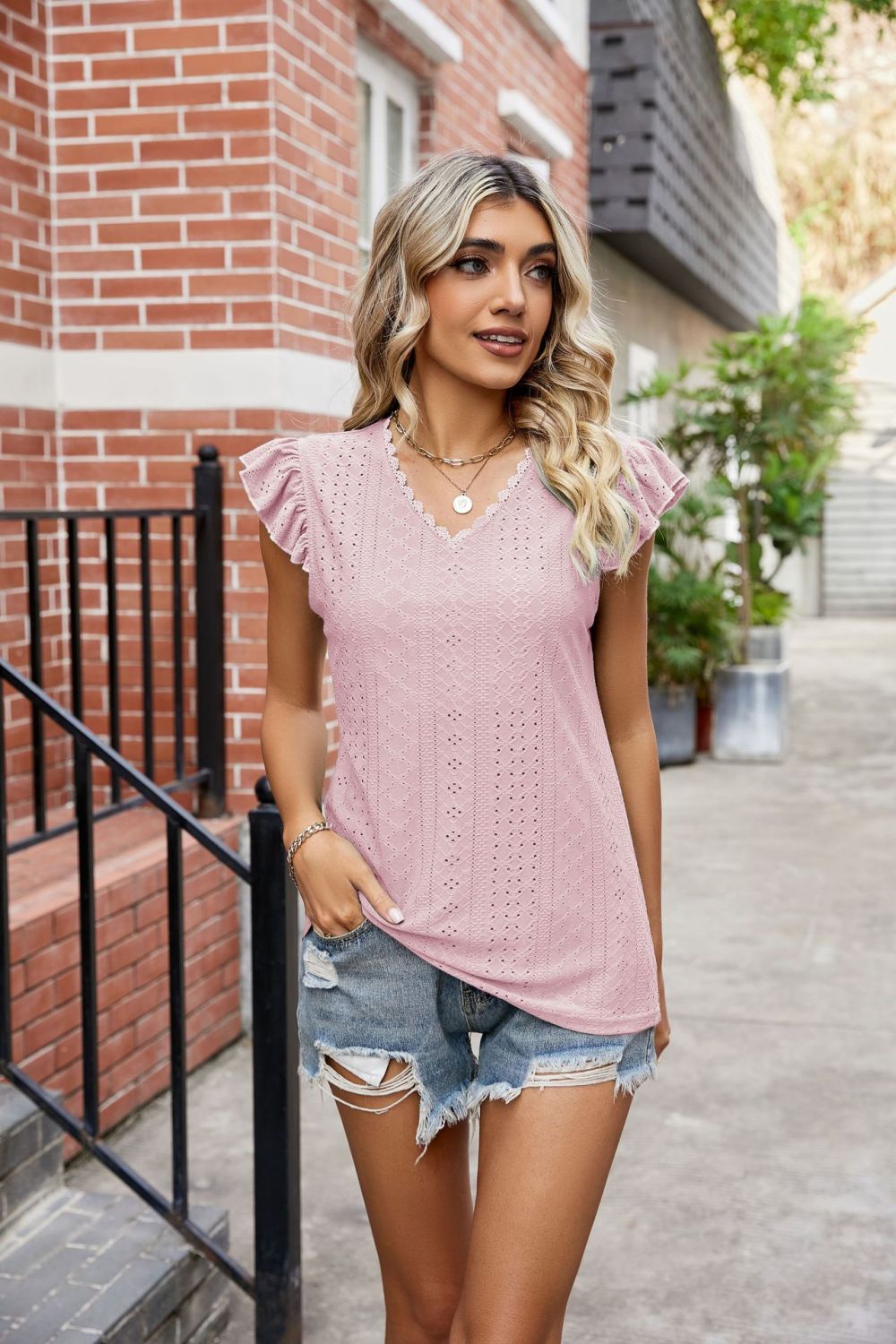 Eyelet flutter sleeve top with scalloped V-neck