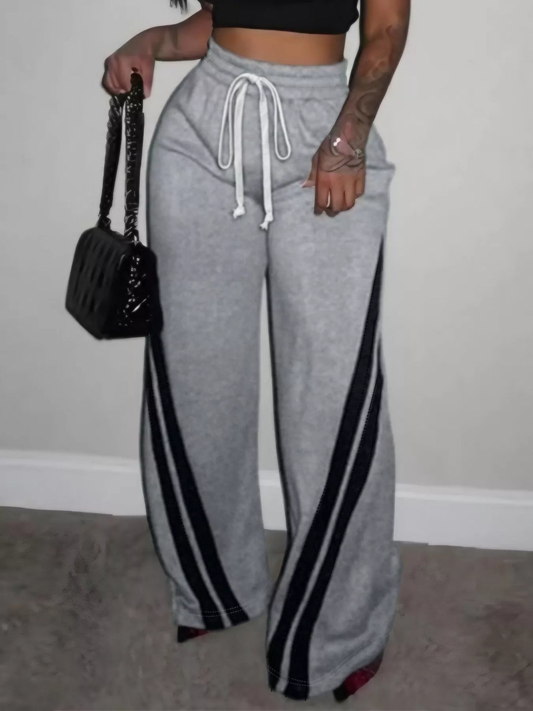 Plus size wide-leg pants with contrast side stripes