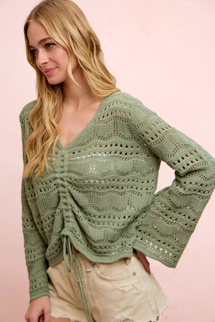 Long sleeve pointelle knit V-neck top with ruched front