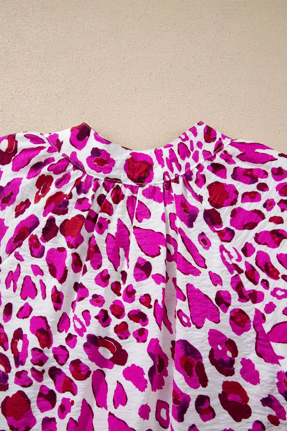Leopard print V-neck blouse with puff sleeves
