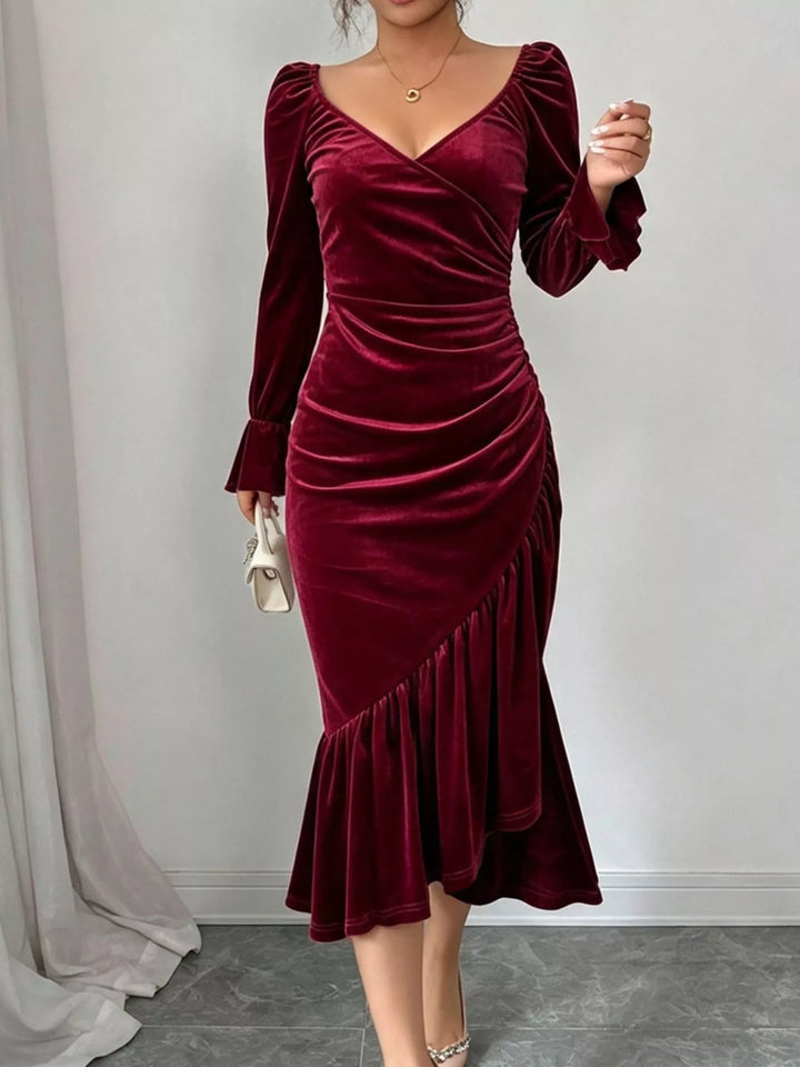 Ruched velvet midi dress with ruffle hem and flared cuffs