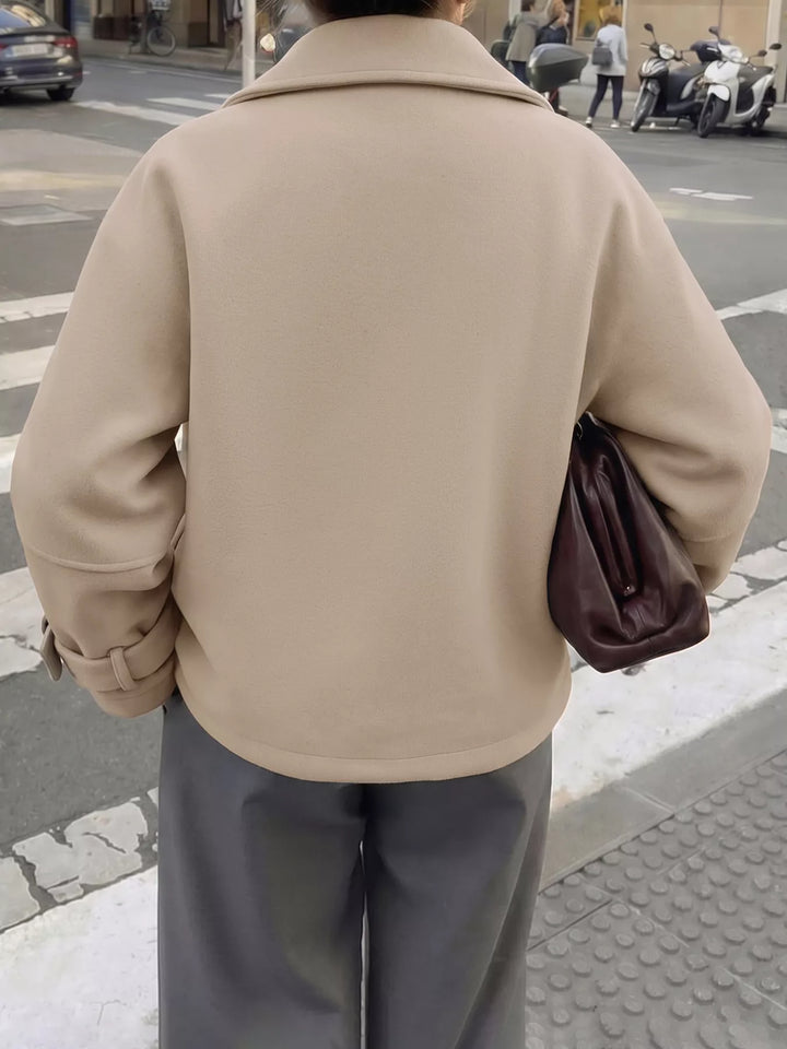 Cropped collared button-up jacket with cuff tabs