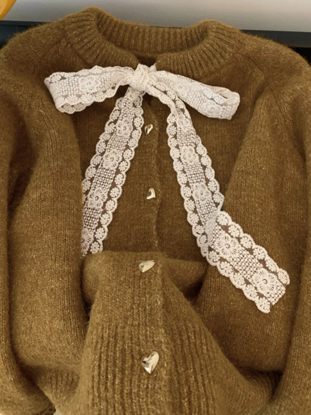 Lace bow knit cardigan with gold heart buttons