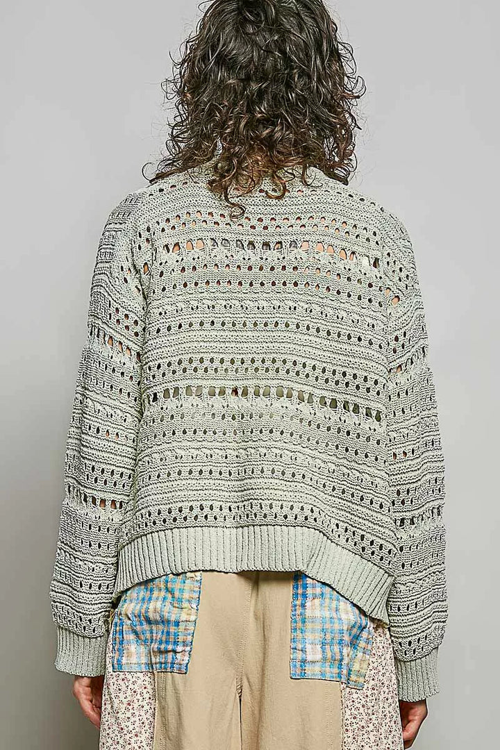 Open-knit V-neck cardigan with 3D floral buttons
