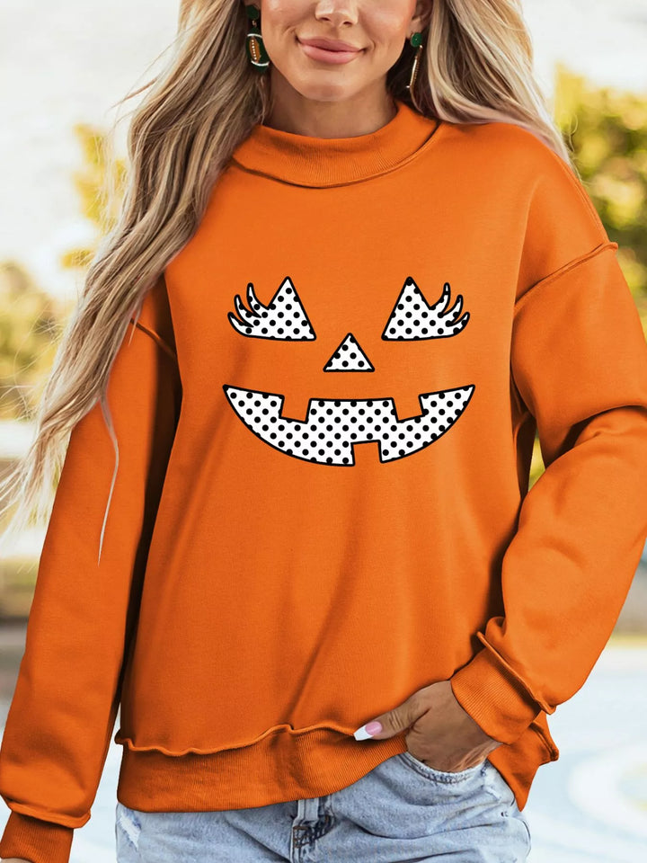 Orange Polka dot jack-o-lantern face graphic pullover sweatshirt