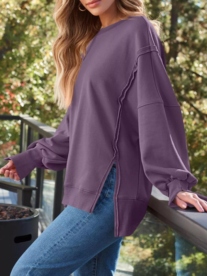 Oversized side-slit sweatshirt with exposed seams