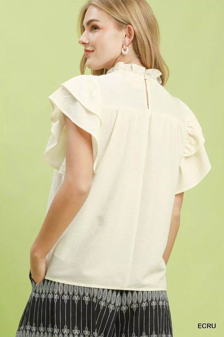 Smocked yoke ruffle flutter sleeve blouse