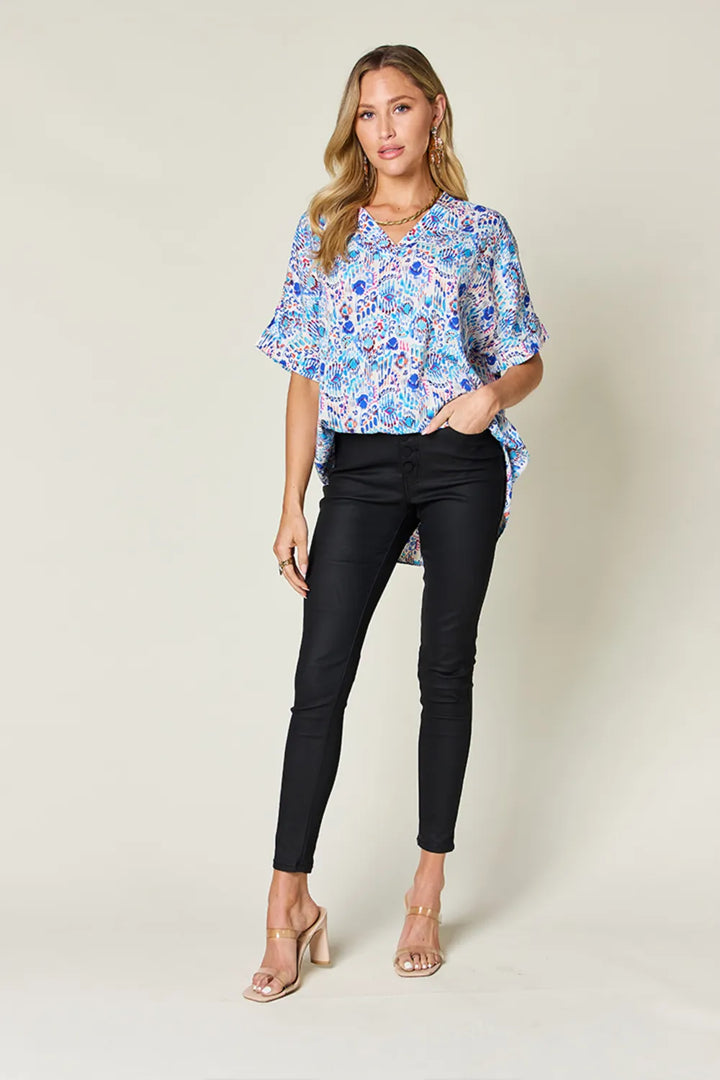 Abstract print V-neck short sleeve tunic blouse