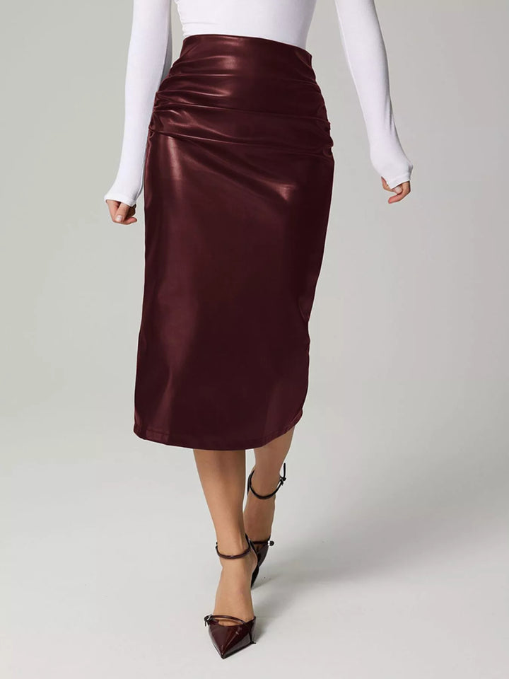 High-rise faux leather midi pencil skirt with back slit