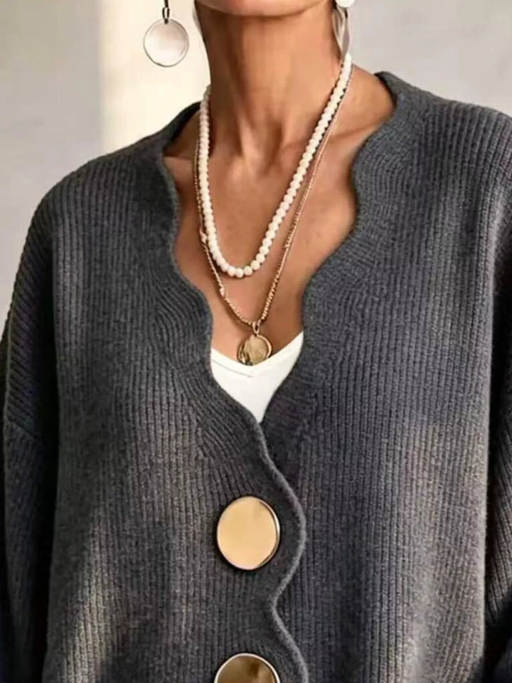 Scalloped-edge ribbed knit oversized button-down cardigan